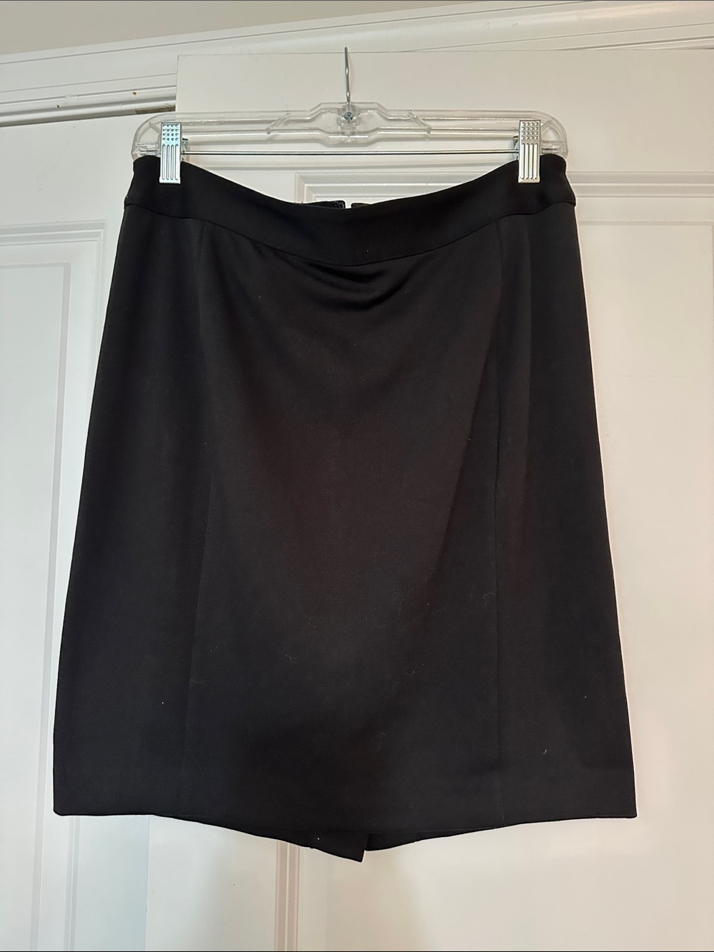Loft size Medium Black Pencil Skirt. Back invisible zipper w/bottom vent/slit